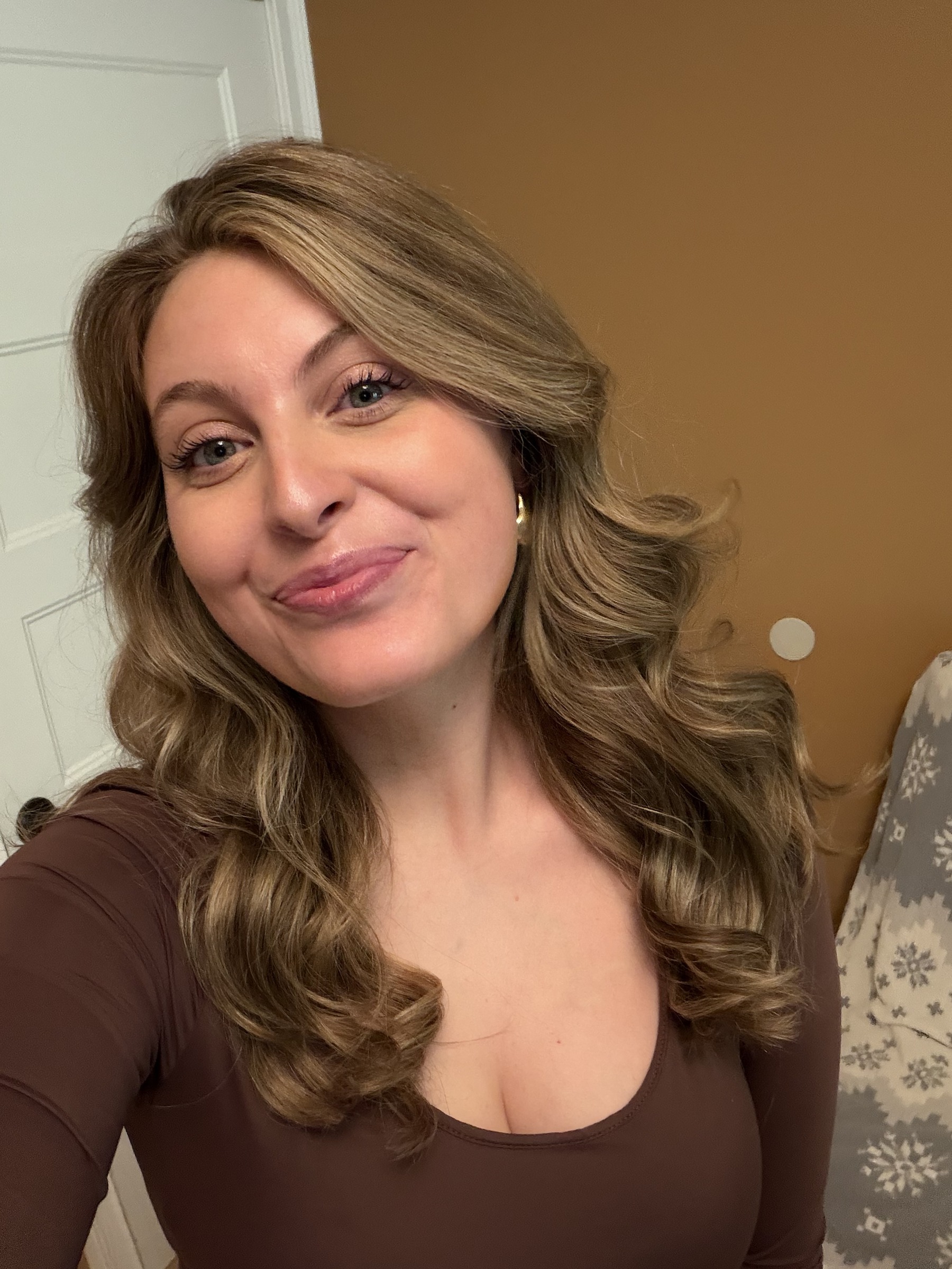 Tristin in a brown top, candid selfie